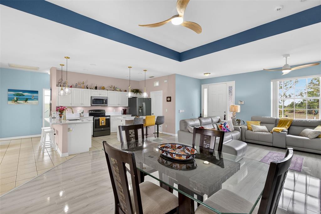 145 Brig Circle East Placida, FL 33946 - Photo 16 of 44 a living room with lots of furniture and kitchen view