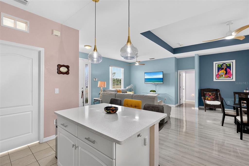 145 Brig Circle East Placida, FL 33946 - Photo 19 of 44 a view of kitchen island with furniture and wooden floor