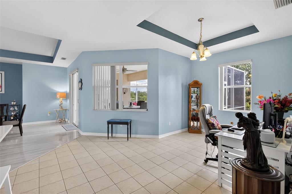 145 Brig Circle East Placida, FL 33946 - Photo 22 of 44 a view of a livingroom with furniture and a kitchen