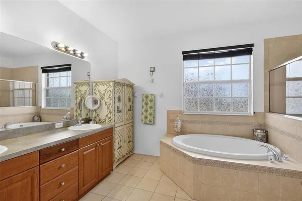a bathroom with a sink and shower