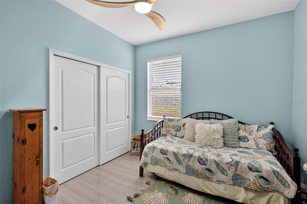 145 Brig Circle East Placida, FL 33946 - Photo 32 of 44 a bedroom with a bed and a window