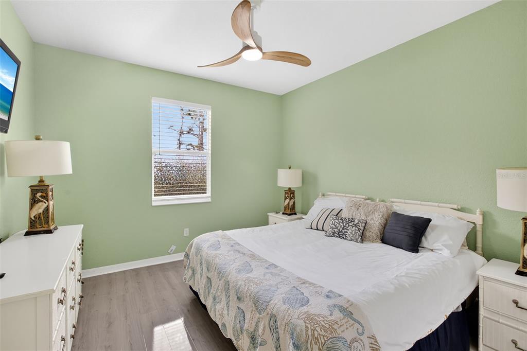 145 Brig Circle East Placida, FL 33946 - Photo 36 of 44 a bedroom with a bed and a window