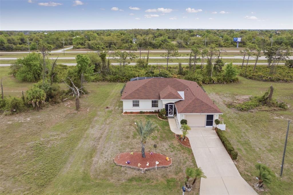 145 Brig Circle East Placida, FL 33946 - Photo 4 of 44 an aerial view of a house with a lake view