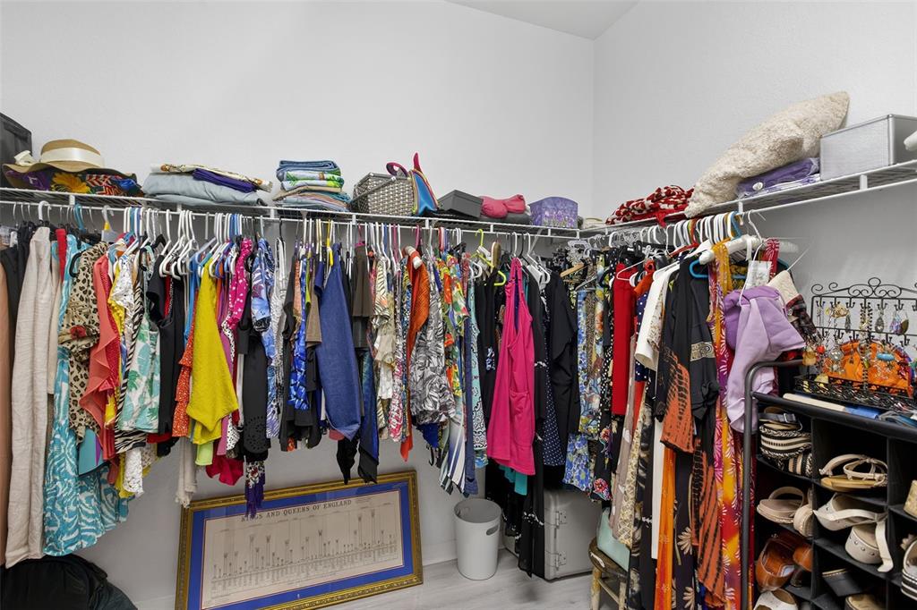 145 Brig Circle East Placida, FL 33946 - Photo 41 of 44 a view of walk in closet with clothes