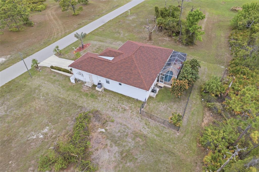 145 Brig Circle East Placida, FL 33946 - Photo 8 of 44 an aerial view of a house with a yard