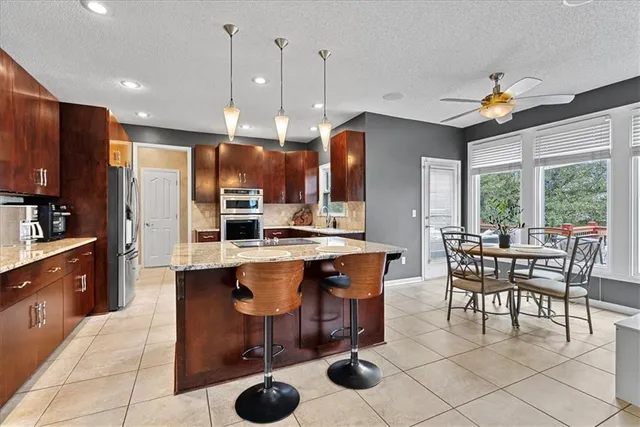 $550,000 | 6714 West 148th Terrace, Overland Park, KS 66223