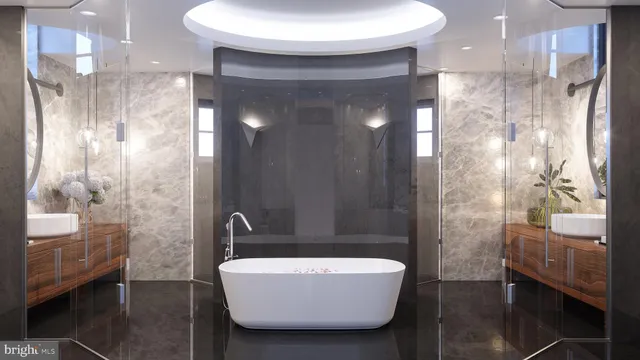 a bathroom with a bathtub and shower