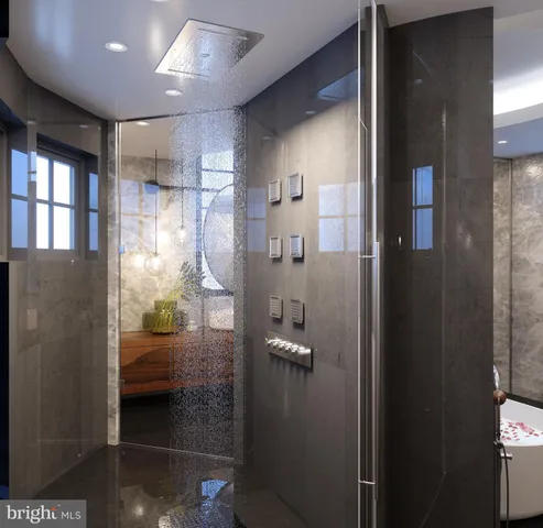 a bathroom with a glass shower door
