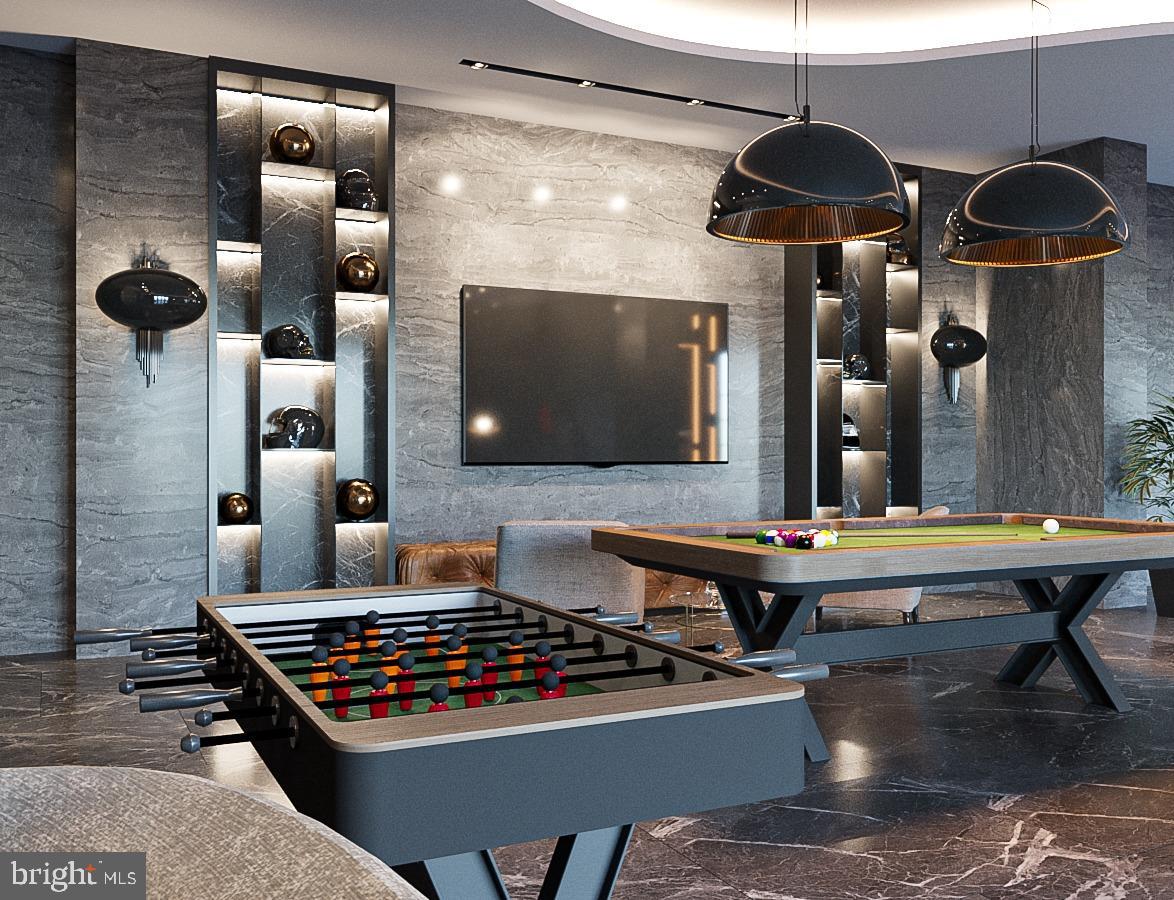 1171 Chain Bridge Road McLean, VA 22101 - Photo 28 of 44 a kitchen with stainless steel appliances granite countertop a stove and a refrigerator