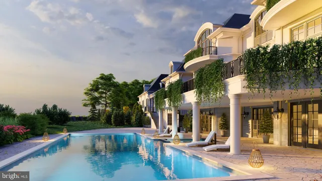 a view of a house with pool and sitting area