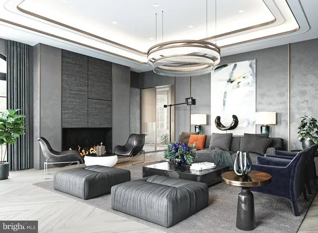 a living room with fireplace furniture and a potted plant