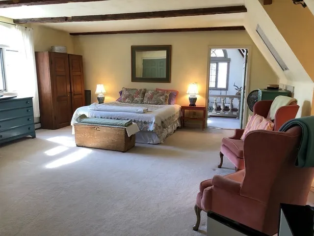 a bathroom with a sink vanity and mirror