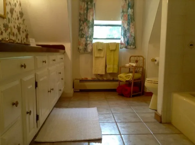 a view of a road with a building in the background