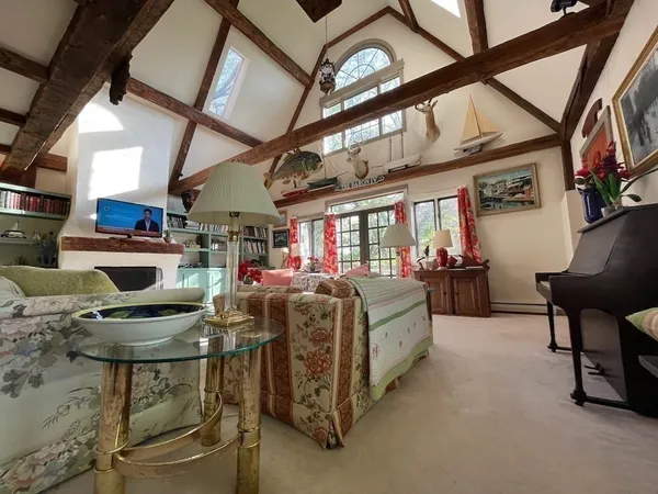 a bathroom with a double vanity sink mirror and shower