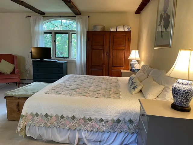 a kitchen with a wooden floor