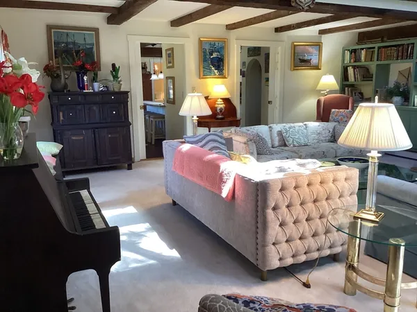 a bed room with a bed and a lamp