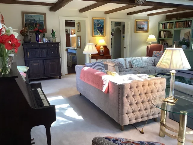 a bed room with a bed and a lamp