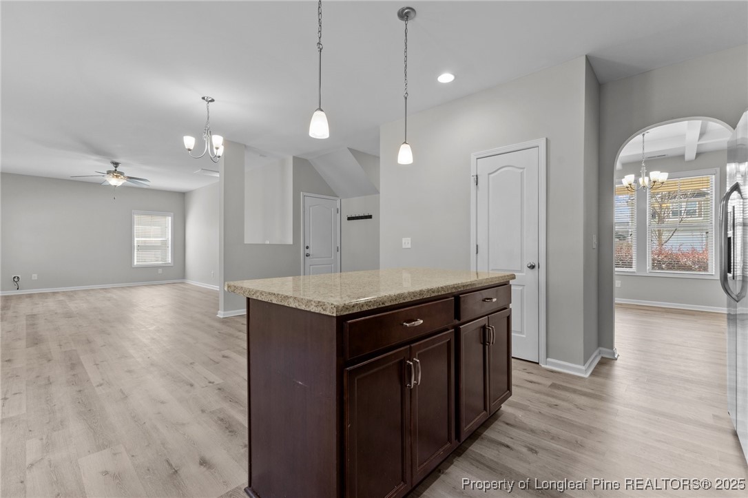 251 Crane Way Bunnlevel, NC 28323 - Photo 30 of 49 a kitchen with a sink a counter top space and appliances