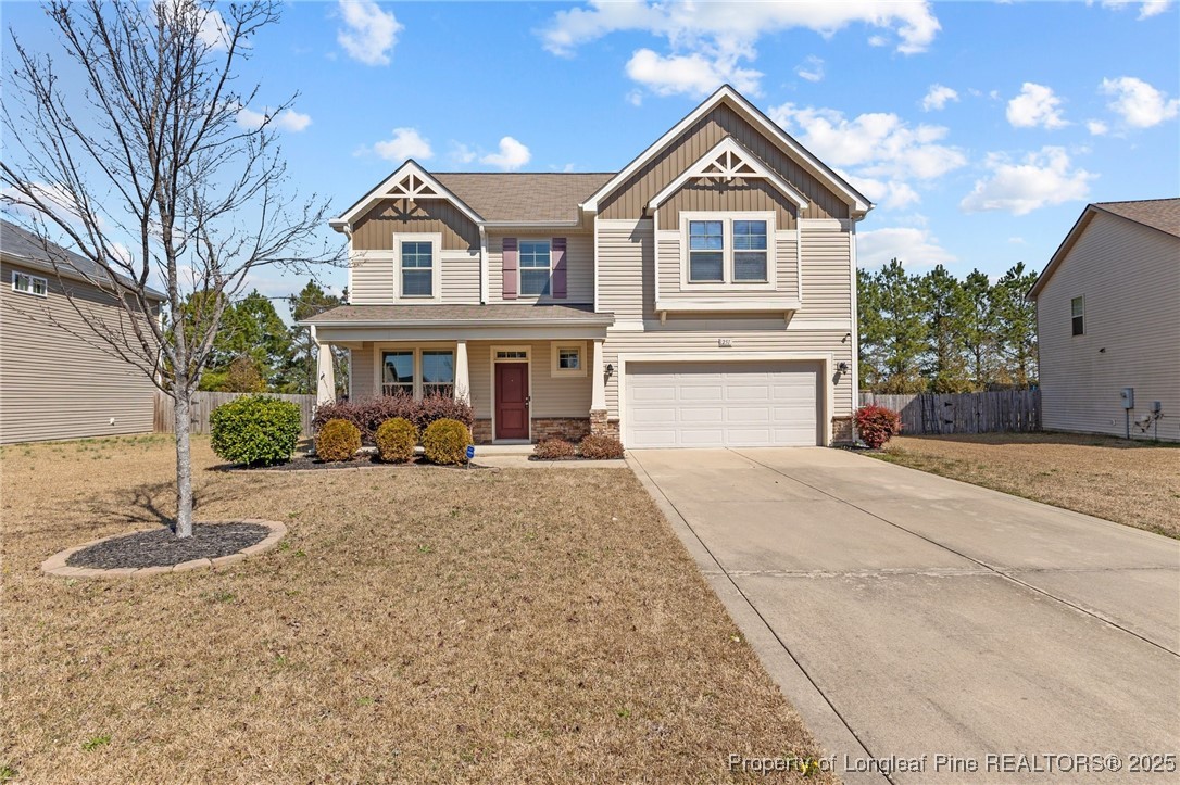 251 Crane Way Bunnlevel, NC 28323 - Photo 3 of 49 a view of a yard in front of house