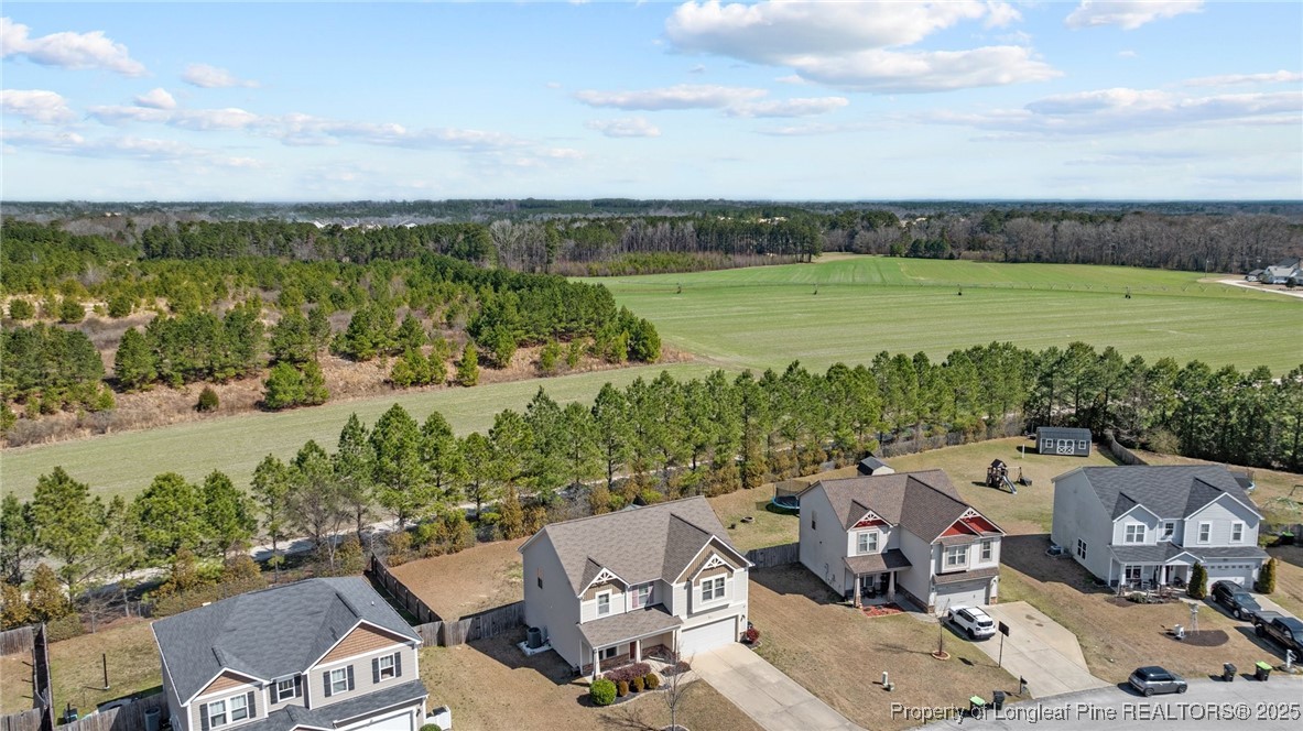 251 Crane Way Bunnlevel, NC 28323 - Photo 48 of 49 an aerial view of a house with garden space and ocean view
