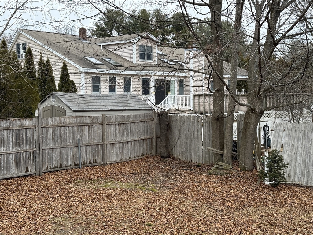 6 Anthony Road Tewksbury, MA 01876 - Photo 11 of 31 a view of a small white house
