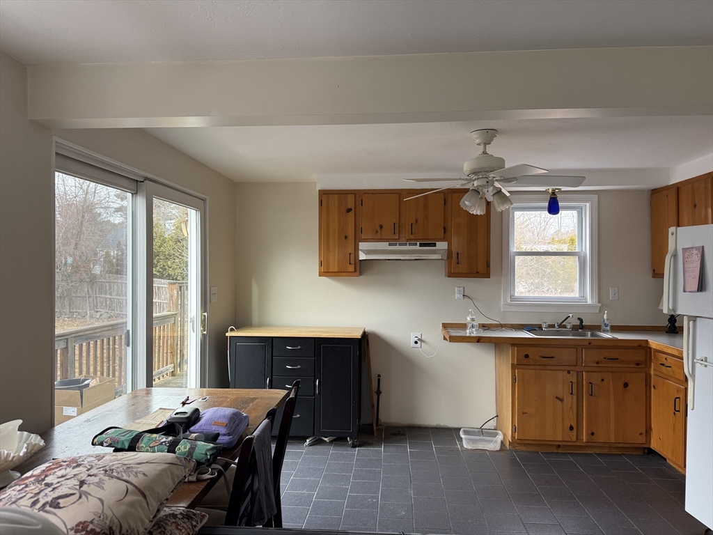 6 Anthony Road Tewksbury, MA 01876 - Photo 15 of 31 a kitchen with a sink cabinets and window