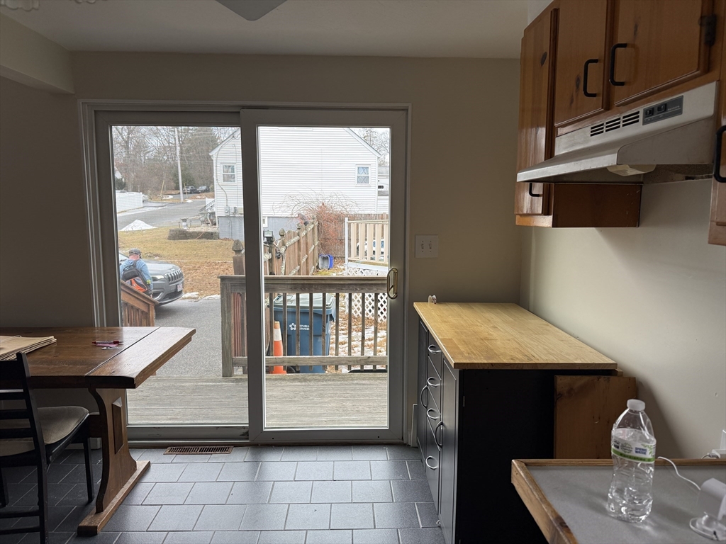 6 Anthony Road Tewksbury, MA 01876 - Photo 16 of 31 a view of a living room and a balcony