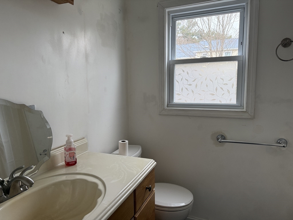 6 Anthony Road Tewksbury, MA 01876 - Photo 20 of 31 a bathroom with a sink toilet and window