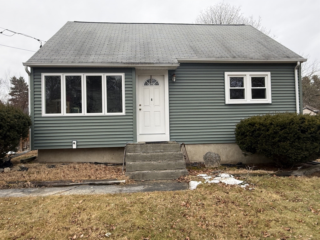 6 Anthony Road Tewksbury, MA 01876 - Photo 2 of 31 a front view of a house