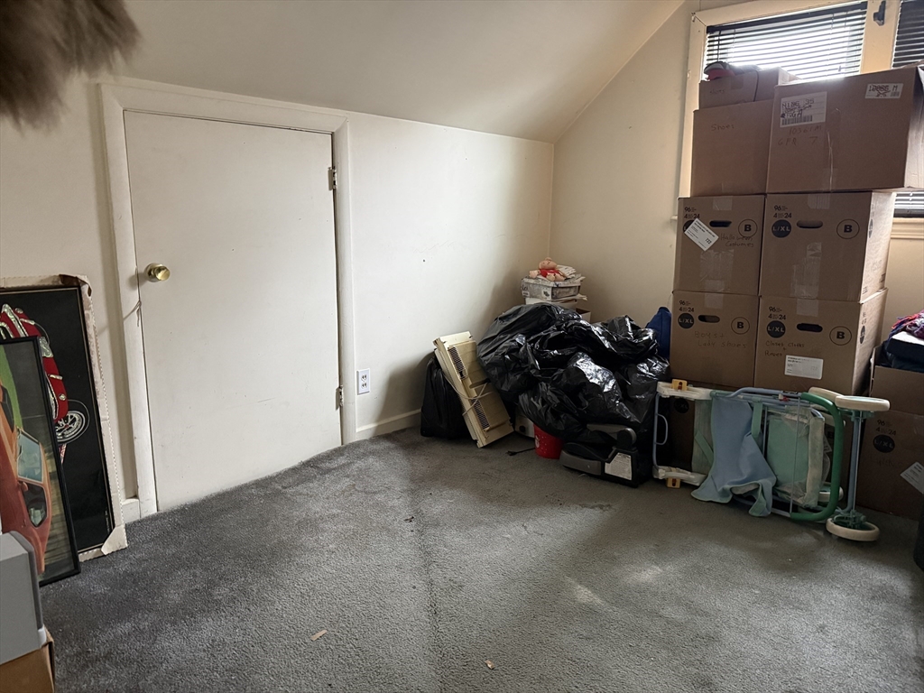 6 Anthony Road Tewksbury, MA 01876 - Photo 23 of 31 a bed room with a bed and a mirror