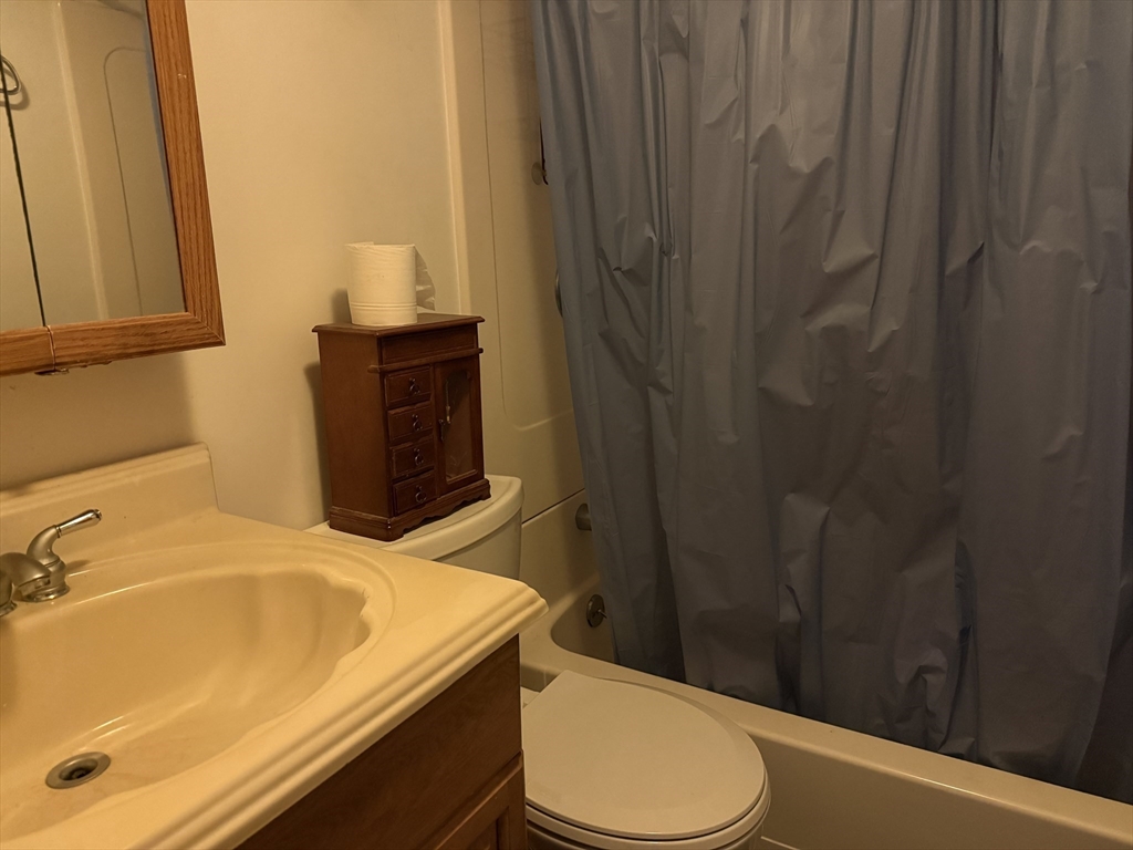 6 Anthony Road Tewksbury, MA 01876 - Photo 26 of 31 a bathroom with a sink and toilet