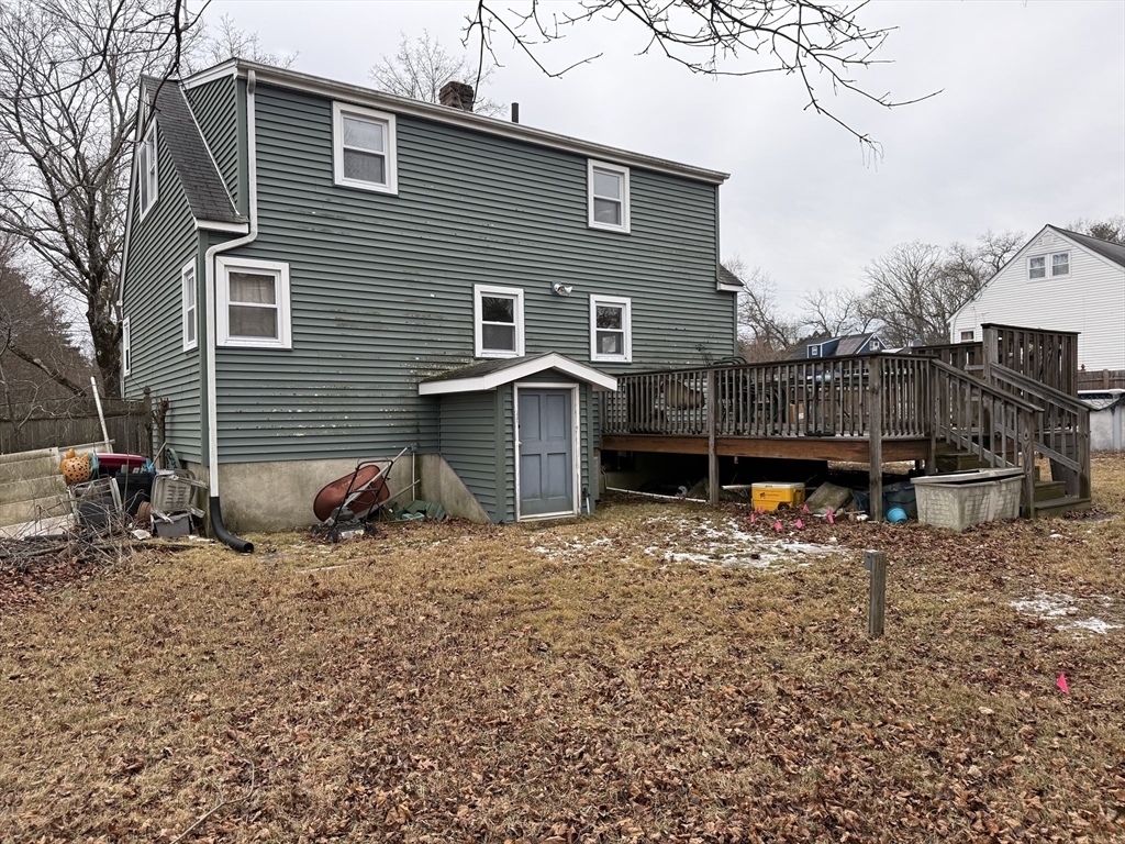 6 Anthony Road Tewksbury, MA 01876 - Photo 7 of 31 a view of a house with a yard and a tree