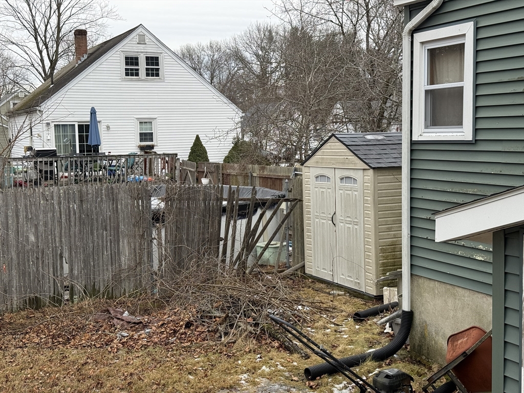 6 Anthony Road Tewksbury, MA 01876 - Photo 8 of 31 a view of a house with a yard