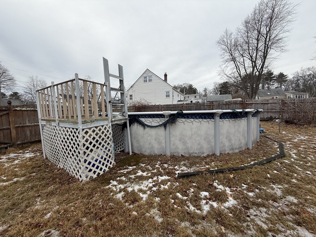 6 Anthony Road Tewksbury, MA 01876 - Photo 10 of 31 a view of balcony with wooden fence and floor