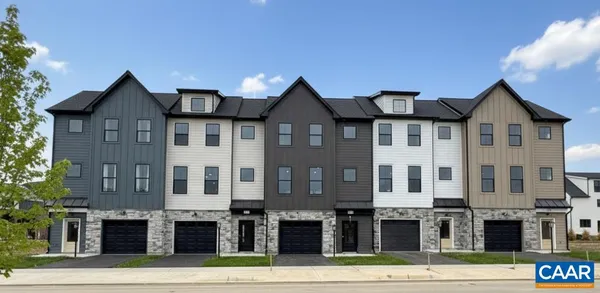 a front view of a building with street view