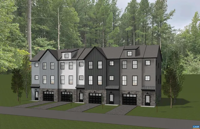 a view of a big house in a big yard with large trees