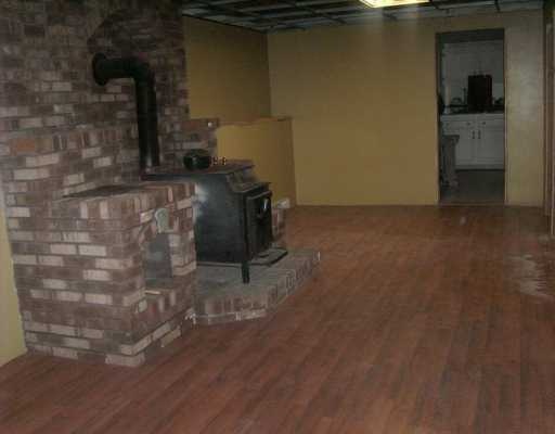 450 Gardiner Road Richmond, RI 02892 - Photo 5 of 10 Den/Family/Great Room. room for your own wood stove....beautiful hearth built by master craftsman