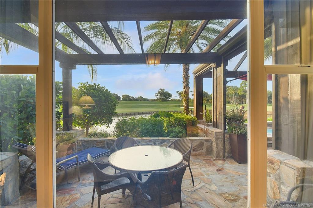 2109 Southeast Talbot Place Stuart, FL 34997 - Photo 25 of 59 Lake and golf course view from the primary bedroom