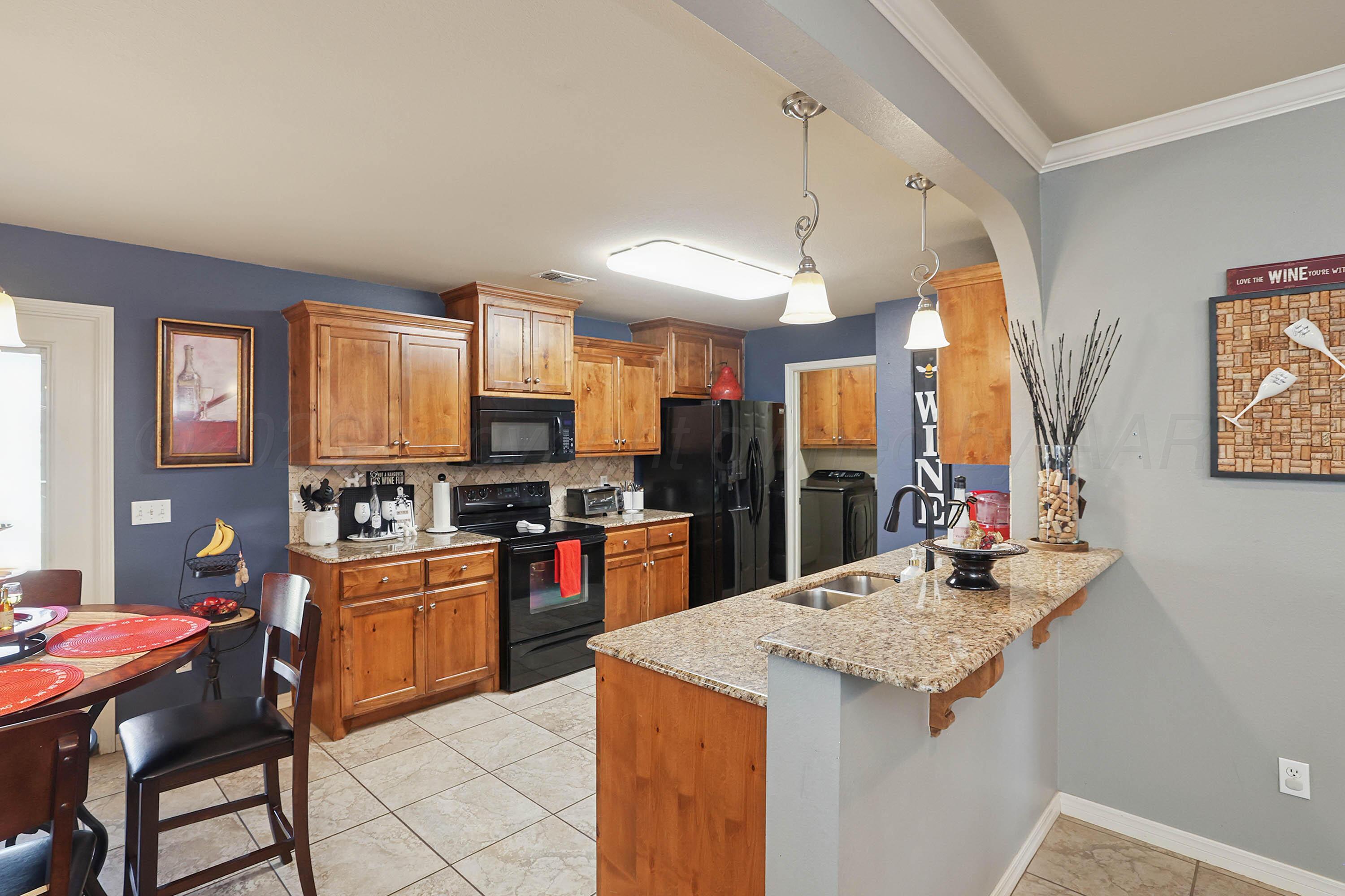 7110 Apollo Trail Amarillo, TX 79118 - Photo 9 of 27 10-Kitchen