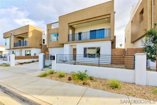 a front view of a house with a garage