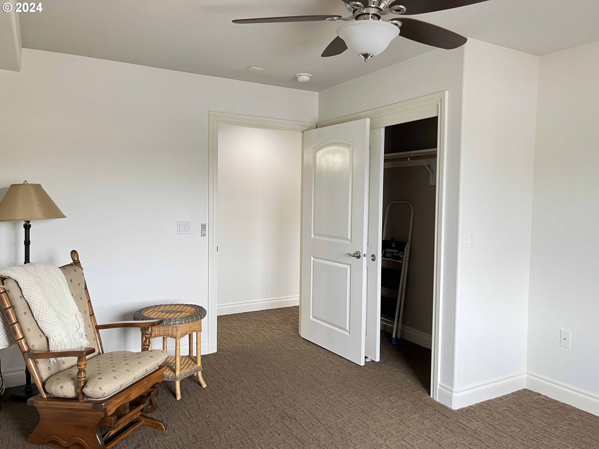 211 Harbor Street, Unit 31 Florence, OR 97439 - Photo 25 of 44 a view of a livingroom with furniture and chandelier fan