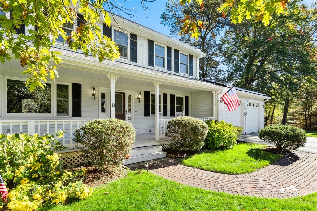 11 Simonds Farm Road Billerica, MA 01862 - Photo 2 of 42 a front view of a house with garden