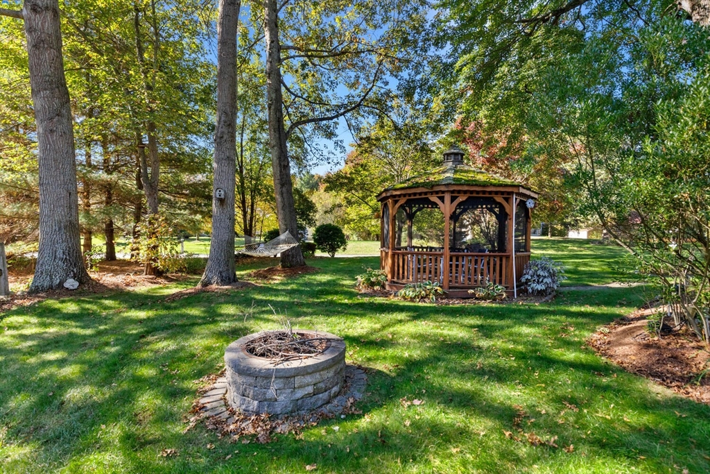 11 Simonds Farm Road Billerica, MA 01862 - Photo 5 of 42 a view of a garden with a fountain