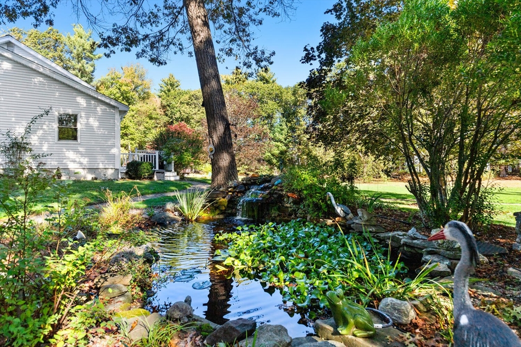 11 Simonds Farm Road Billerica, MA 01862 - Photo 7 of 42 a backyard of a house with lots of green space