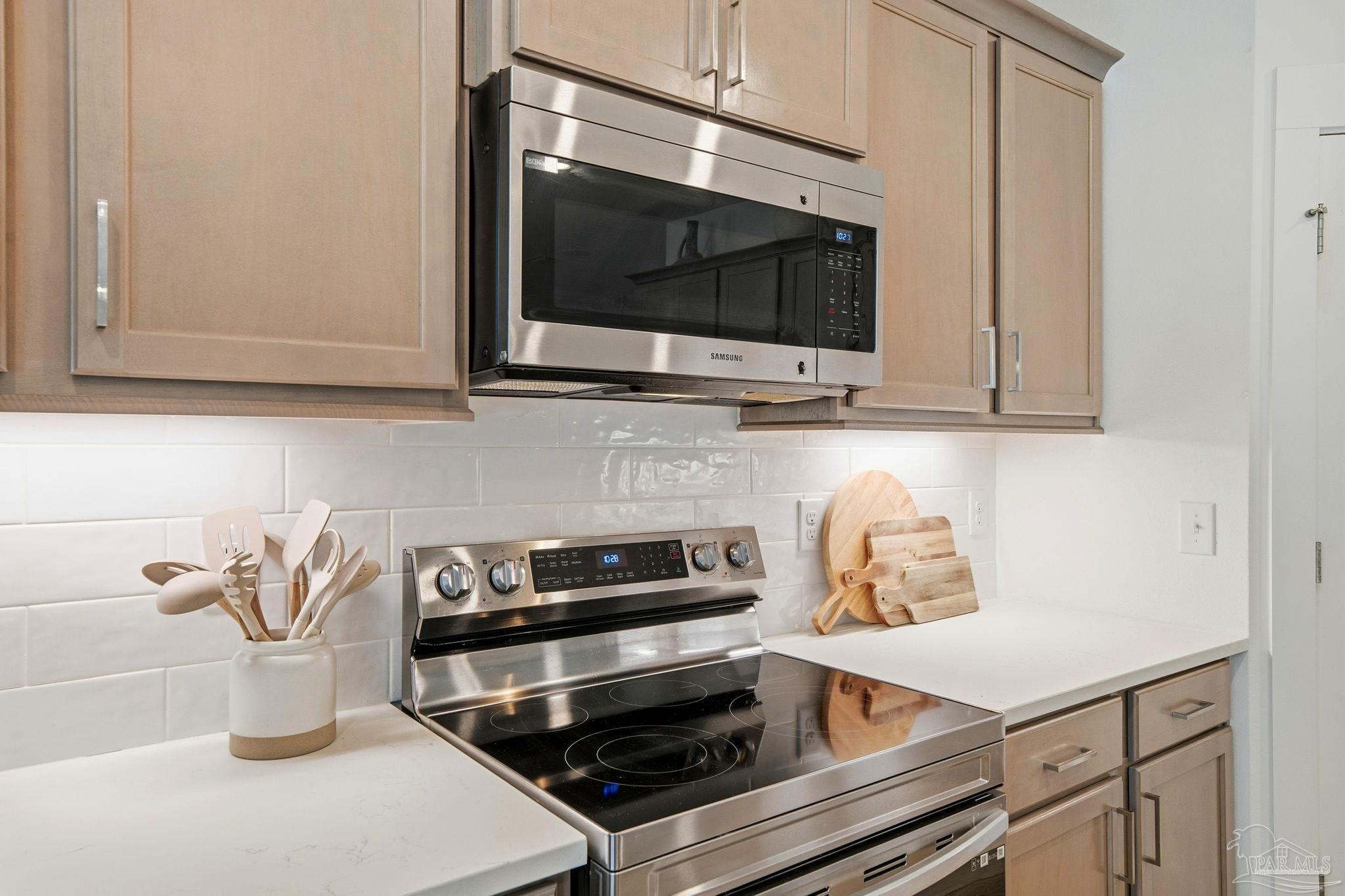 6228 Dry Crk Road Molino, FL 32577 - Photo 15 of 64 a kitchen with a stove and a microwave