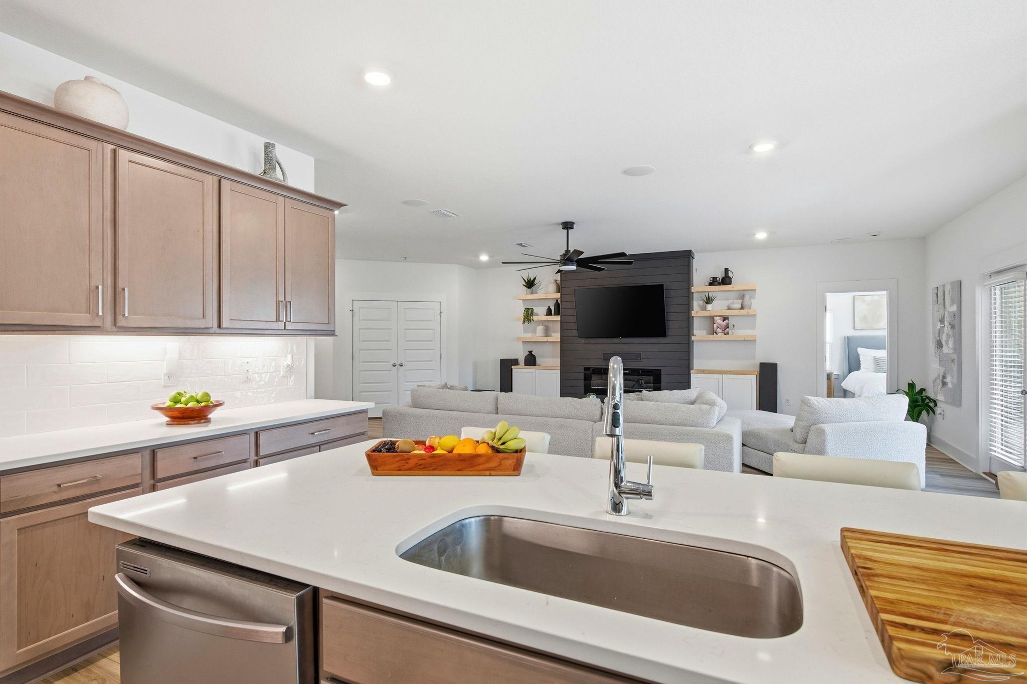 6228 Dry Crk Road Molino, FL 32577 - Photo 16 of 64 a kitchen with a sink a counter and chairs