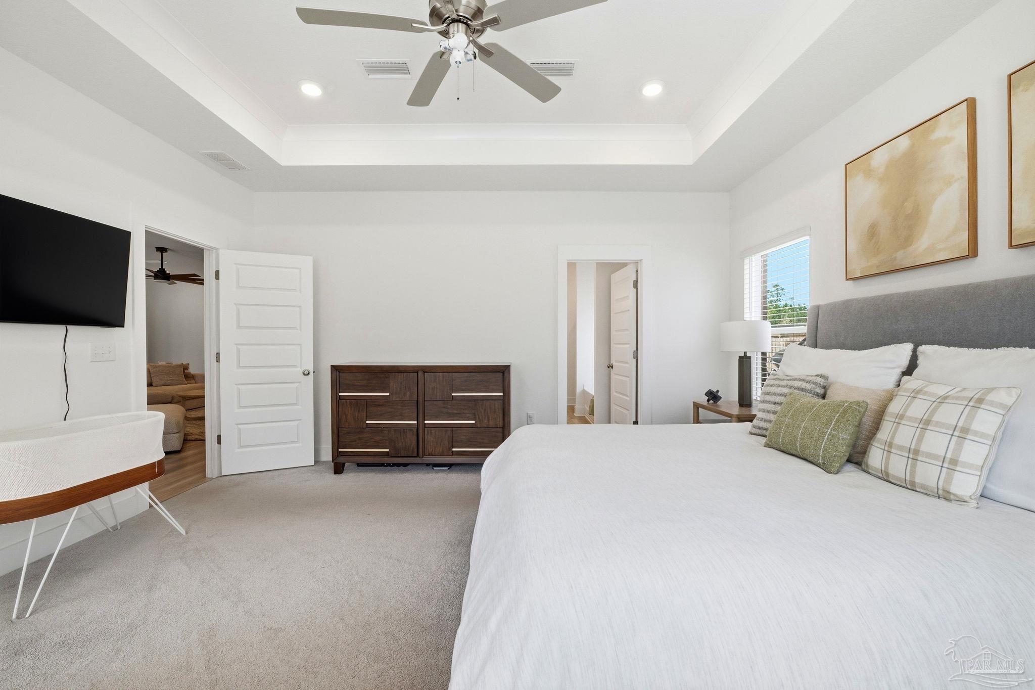 6228 Dry Crk Road Molino, FL 32577 - Photo 23 of 64 a bedroom with a bed and a television