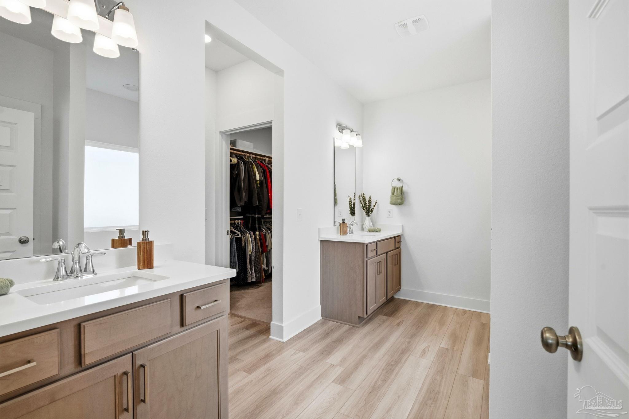 6228 Dry Crk Road Molino, FL 32577 - Photo 24 of 64 a bathroom with a sink a mirror and a shower