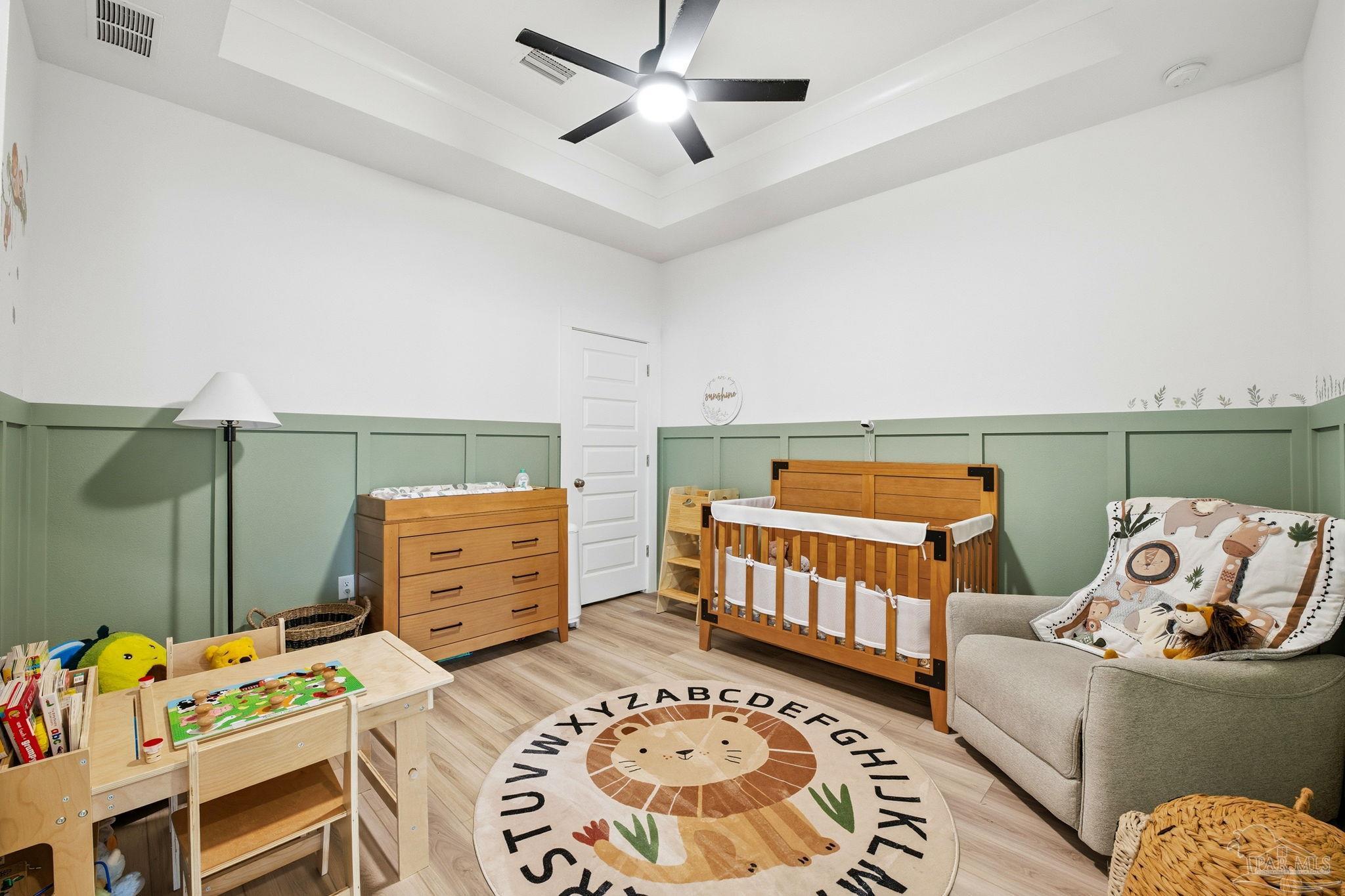 6228 Dry Crk Road Molino, FL 32577 - Photo 28 of 64 a bedroom with furniture and a wooden floor