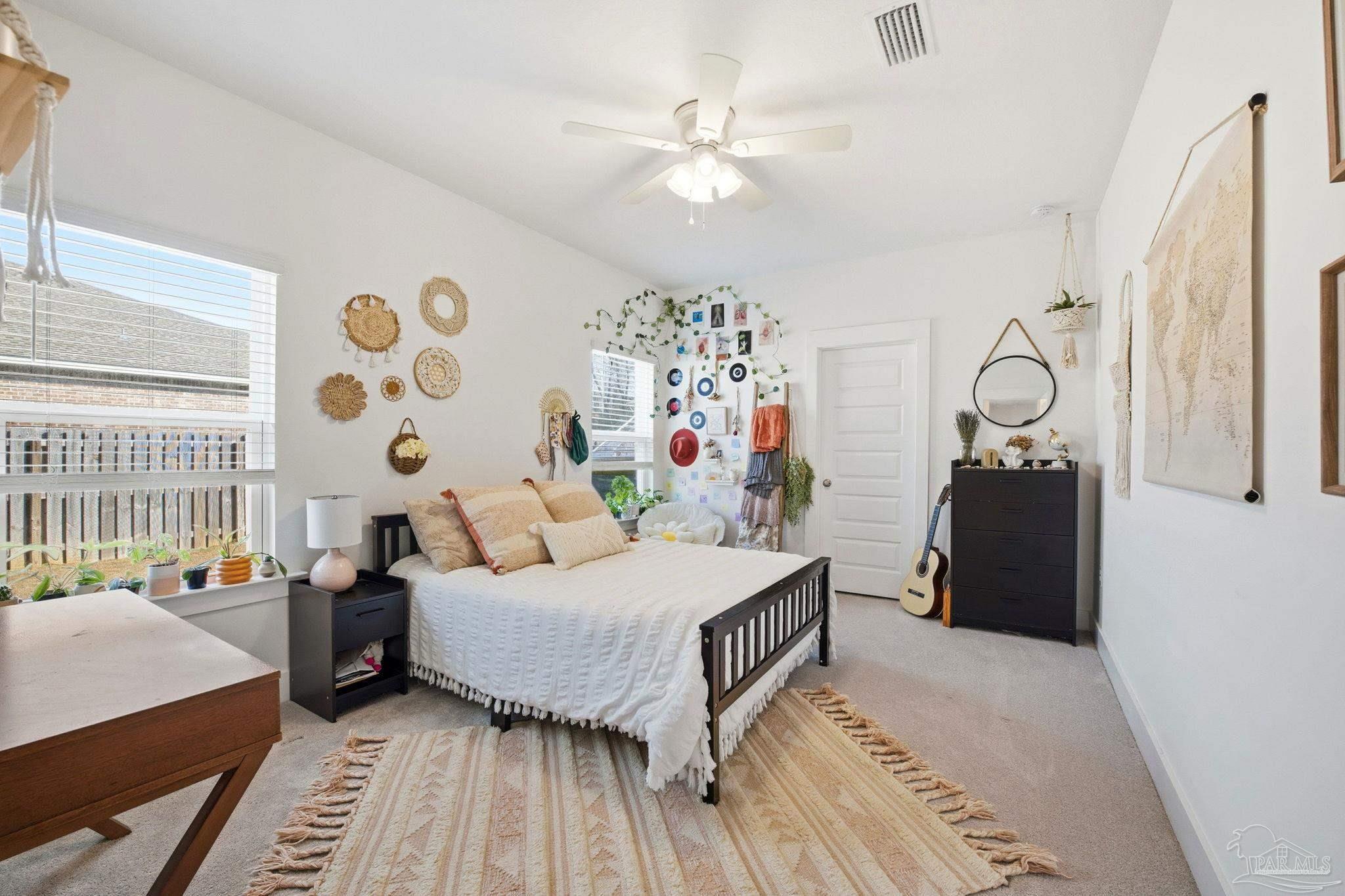 6228 Dry Crk Road Molino, FL 32577 - Photo 47 of 64 a living room with a bed furniture and a window